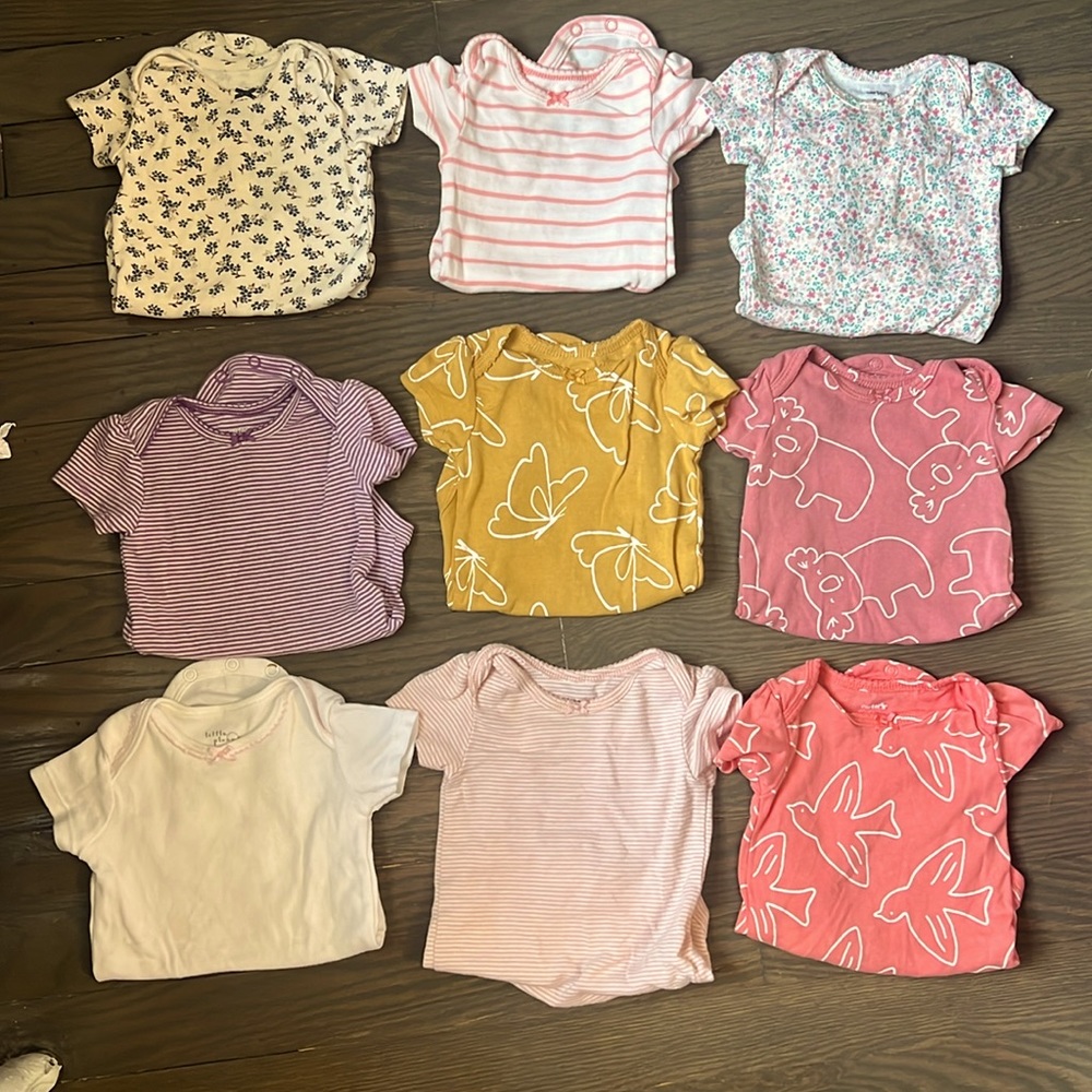 Nine gently used 6th month onesies. Eight are Carter brand and 1 is little plant